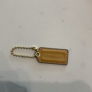 Coach Tan Leather hangtag